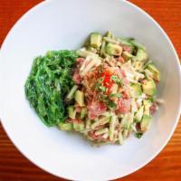 Classic Tuna Bowl  · Tuna, avocado, ginger, cucumber, and cilantro tossed in a wasabi infused ponzu sauce and mas...