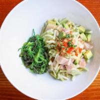 Yellow Tail Bowl · Yellowtail, avocado, ginger, cucumber, and cilantro tossed in ponzu sauce topped with mango ...