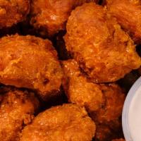 Boneless Chicken Wings (1Lb) · 1 lb. of boneless wings is a minimum of 10. Served with a side homemade blue cheese dressing...