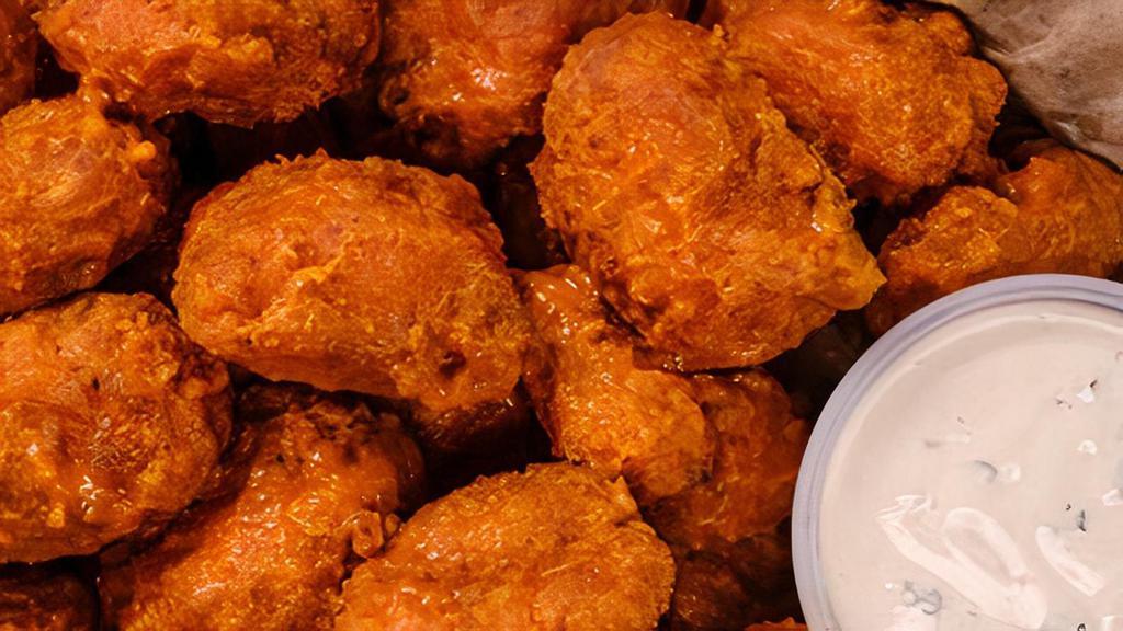 Boneless Chicken Wings (1Lb) · 1 lb. of boneless wings is a minimum of 10. Served with a side homemade blue cheese dressing and celery.