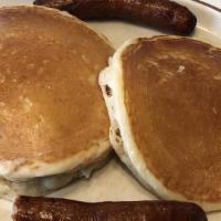 Buttermilk Pancakes With Sausage · Thin flat cake.