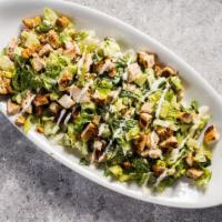 Classic Caesar Salad · Homemade dressing, parmesan, croutons & grated padano cheese.