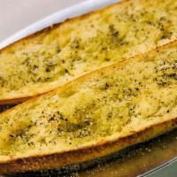 Garlic Bread · Toasted loaf with fresh garlic & imported extra virgin olive oil.