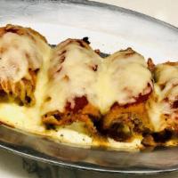 Eggplant Rollatini · Fried eggplant stuffed with ricotta, topped with homemade sauce & side of bread.