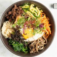 Bibim Bap · Sauteed and seasoned vegetables mix with rice. Served with a fried egg on top and house spic...