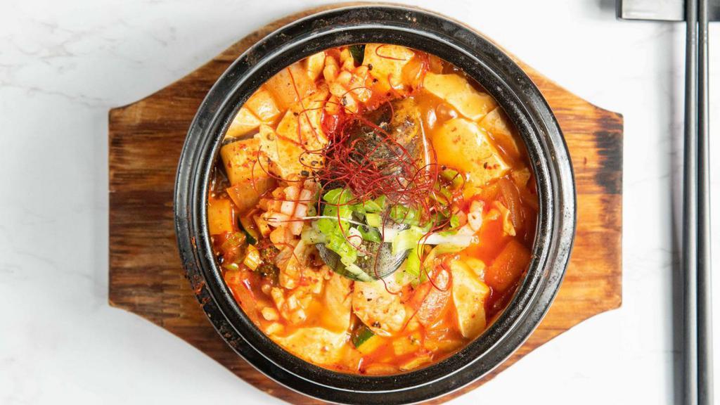 Soon Dubu · Spicy silken tofu soup with your choice of toppings.