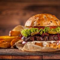 Bbq Burger · Juicy, grilled beef patty and smoky BBQ sauce served on a soft, toasted bun with fresh lettu...