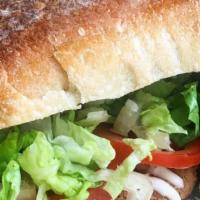 Chick'N Cutlet Hero · Vegan. Crispy vegan chick'n cutlets on a toasted long roll with shredded lettuce, tomato and...