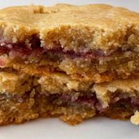 Pb & J Cookie · Peanut Butter Cookie filled with Grape Jelly, vegan and GF!