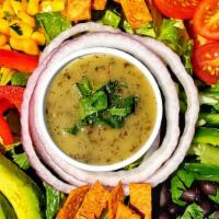 Southwest Salad · Corn, Black Beans, Red Onion, Cherry Tomatoes, Diced Bell Pepper, Avocado, & Fried Corn Tort...