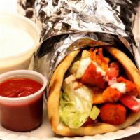 Chicken Gyro Sandwich · Chunks Of Chicken on Special Gyro Pitas with your choice of Different Toppings
