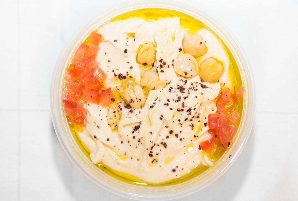 Hummus · Gluten-free, vegetarian. Chickpeas, tahini, lemon juice and extra virgin olive oil.