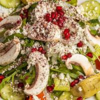 Momo Salad With Feta · Gluten-free. Romaine lettuce, tomato pepper, artichoke, kalamata olives.