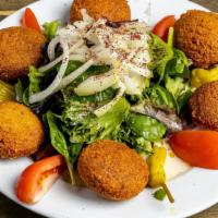Falafel Plate · Gluten-free, vegetarian, chef recommendation. Falafel, lettuce and tomato served with tahini.