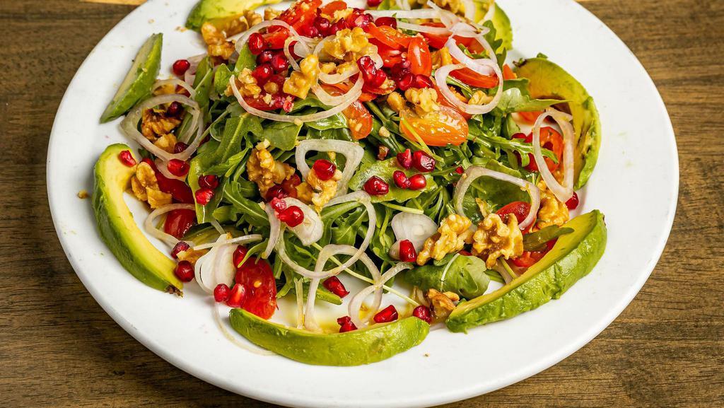 Arugula Salad · Gluten-free, vegetarian, chef recommendation. Baby arugula with walnuts, avocado with balsamic dressing.