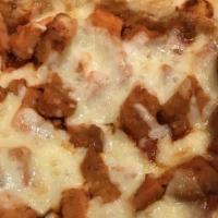 Buffalo Chicken Pie · Shredded chicken breast tossed in a sweet & spicy sauce & mozzarella cheese.