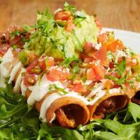 Flautas · Two hand rolled fried tortillas, sour cream, pico de gallo and guacamole, stuffed with chees...