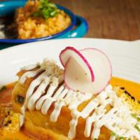 Chile Relleno · Chile poblano stuffed with ground beef, Oaxaca cheese, and creamy roasted red sauce. Served ...
