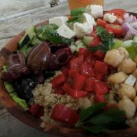 Buddha Bowl · Kale, quinoa, cranberries, green apples, celery, cucumber, orange, almonds, carrots and chic...