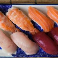 Salmon +Ahi+Hamachi +Ebi · Enjoy 2 pieces each of Salmon, Ahi, Hamachi, and Ebi Nigiri Sushi.