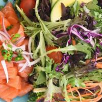 Ahi Or  Salmon Poke Salad · Enjoy this fresh green salad complemented with Salmon and Avocado. Served with house Sesame ...