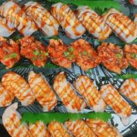 #9. Aburi Lover’S Platter  · 32 piece,8 piece spicy ahi,12 piece garlic salmon,12 piece garlic ahi