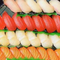 #12. Hotate Platter  · 8 piece ahi,8 piece salmon,10 piece hamachi,8 piece Japanese scallops Nigini