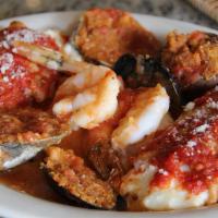 Hot Antipasto · Clams, Mussels, Stuffed Mushrooms, Shrimp, Eggplant Rollatini.