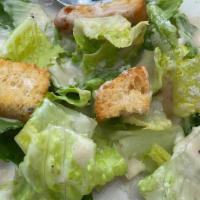 Caesar Salad · Romaine Lettuce, Parmesan Cheese, Croutons (without anchovies).