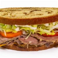 Club Sandwiches - Roast Beef · Contains: White Toast, American, Mayo, Lettuce, Tomato, Applewood Smoked Bacon, Roast Beef
