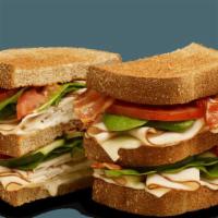 Club Sandwiches - Turkey Veggie Ranch · Contains: Wheat Toast, Swiss, Ranch Dressing, Tomato, Cucumbers, Spinach, Applewood Smoked B...
