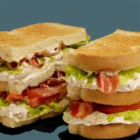 Club Sandwiches - Tuna Salad · Contains: White Toast, American, Mayo, Lettuce, Tomato, Applewood Smoked Bacon