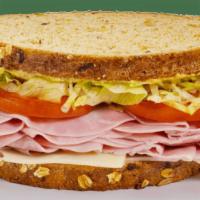Stacked Sandwich - Ham & Swiss · Contains: Multi Grain Bread, Lettuce, Tomato, Meat