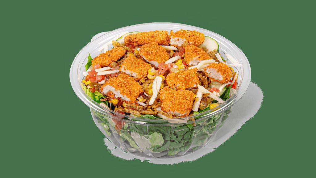 Tex Mex Chicken Strips · Contains: Chicken Strips, Cheddar, Fresh Salsa, Cucumbers, Fire Roasted Corn, Salsa Verde, Crispy Jalapenos
