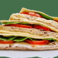 Egg Omelet - Garlic Smoked Turkey & Egg · Contains: Plain Cream Cheese, Spinach, Tomato, Egg Omelet, Tortilla, Oven Roasted Turkey