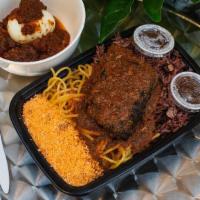 Street Waakye  · A popular Ghanaian Dish made of rice & beans with mackerel, gari, spaghetti, tomato stew and...