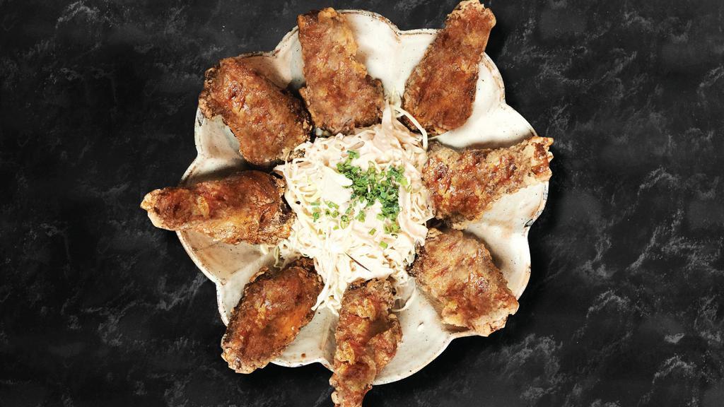 Dak Nalgae Twigim · Marinated fried chicken wings.