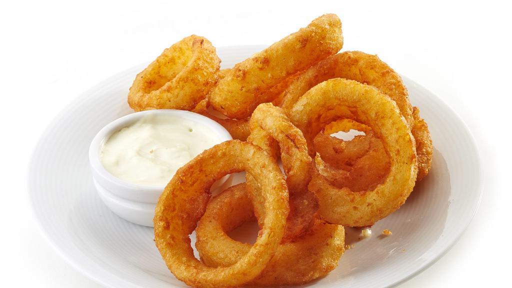 Onion Rings · Golden-crispy onion rings salted to perfection.