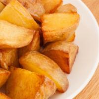 Home Fries · Cubed potatoes salted and fried to perfection.