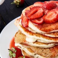 Strawberry Pancakes · 3 Perfectly cooked buttermilk pancakes topped with fresh strawberries.