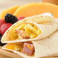 Classic Egg Wrap · Delicious Breakfast wrap topped with Ham, Two Eggs, Cheese & Home Fries. Served on customer'...
