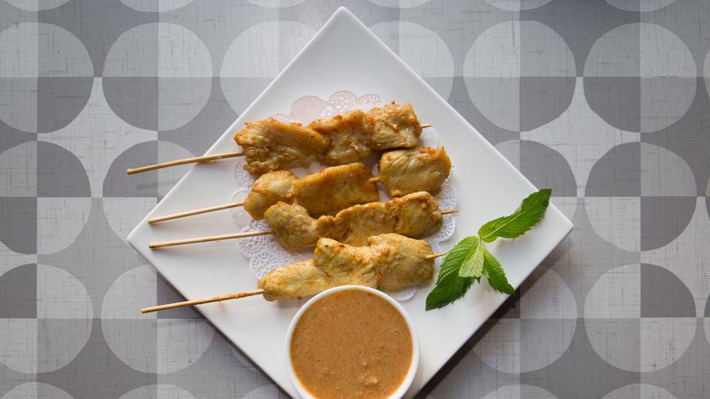 Chicken Satay · Spicy. Grilled chicken on skewers with peanut sauce. Hot and spicy.