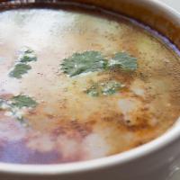 Tom Kha Gai · Spicy Thai coconut milk soup with chicken, mushroom, lime juice, and galangal ginger. Hot an...