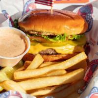 All-American Burger · Freshly grilled 6-ounce burger served on a brioche bun topped with your choice: spirit of ’7...