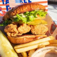 Love Me Tender Chicken Sandwich · Our hand-breaded chicken tenders served on a brioche bun. Topped with your choice: spirit of...