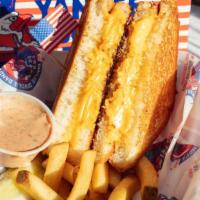 Triple-Play Grilled Cheese · An All-American classic has done right, with American cheese and our famous Texas toast. Ser...