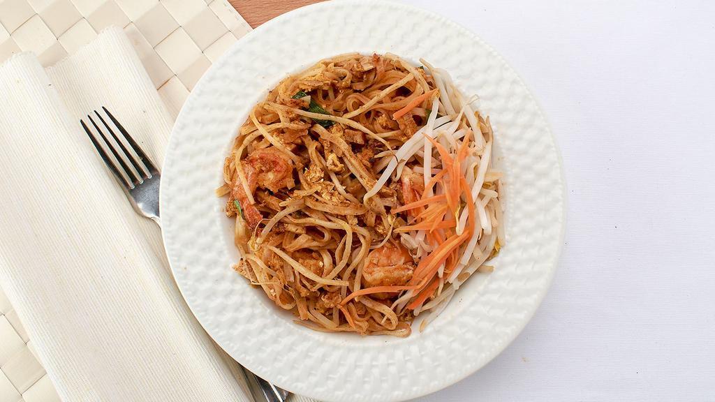 Pad Thai · Rice noodles tossed in a savory sauce with chicken or shrimp, green onions, tofu, eggs and crushed peanuts.