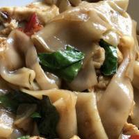 Drunken Noodle · Hot & spicy. Stir fried white flat noodle with chili and basil leaves. Choice of chicken, be...