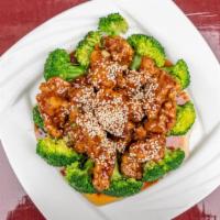 Sesame Chicken · Top Menu Item. Tangy, crispy shredded or chunk chicken topped in roasted sesame seed and emb...