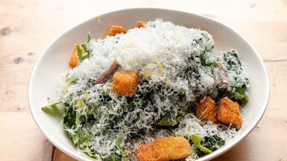Kale Caesar · Anchovy, parmesan and crouton.